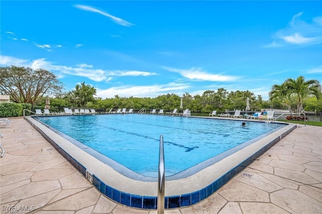 view of pool featuring a patio