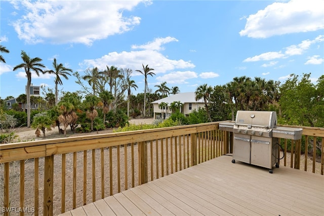 wooden deck with grilling area