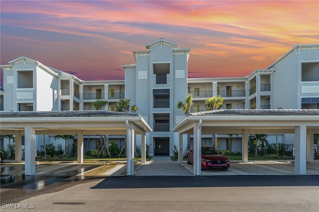 view of outdoor building at dusk