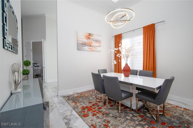 dining area featuring ornamental molding