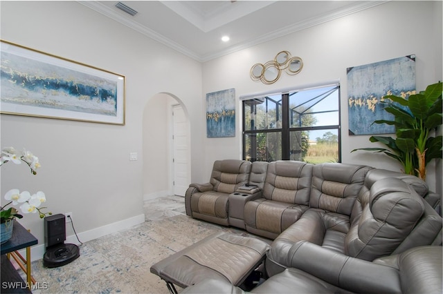 living room featuring crown molding