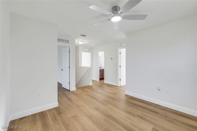 unfurnished room featuring ceiling fan and light hardwood / wood-style floors