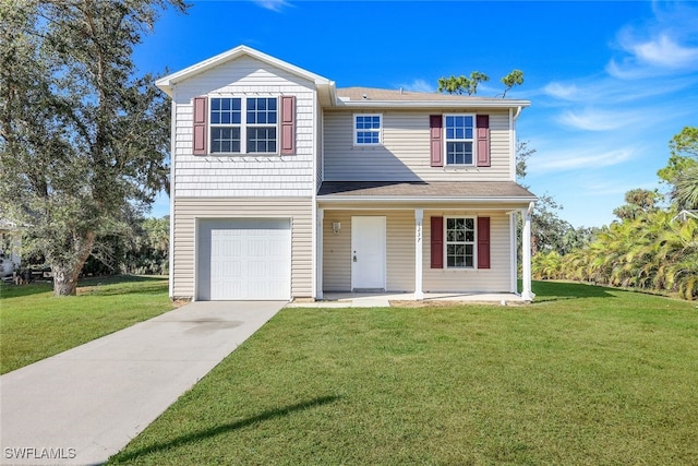 view of front of home with covered porch, a garage, and a front yard