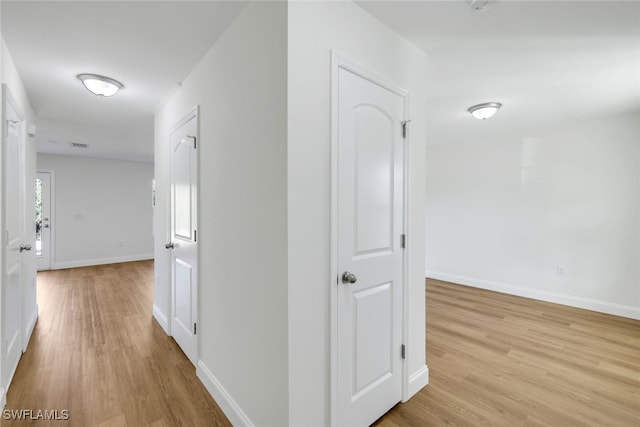 hall featuring light hardwood / wood-style floors