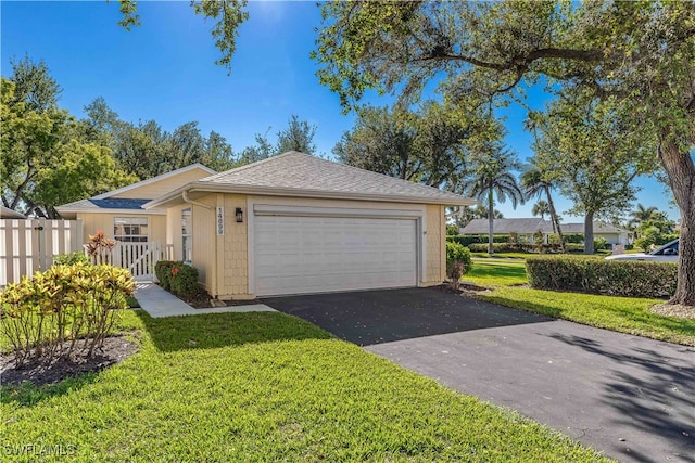 garage with a lawn