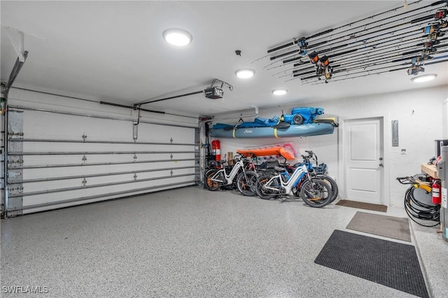 garage featuring a garage door opener