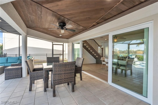 exterior space featuring ceiling fan and an outdoor hangout area