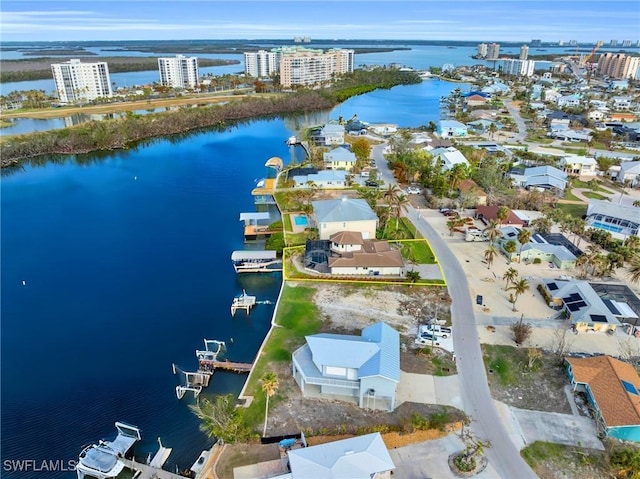 drone / aerial view with a water view