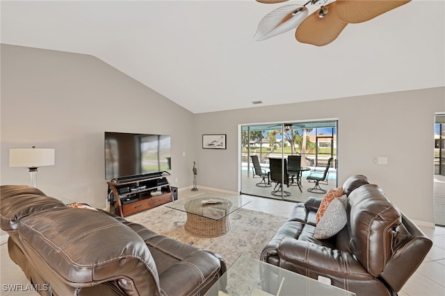 tiled living room with high vaulted ceiling and ceiling fan