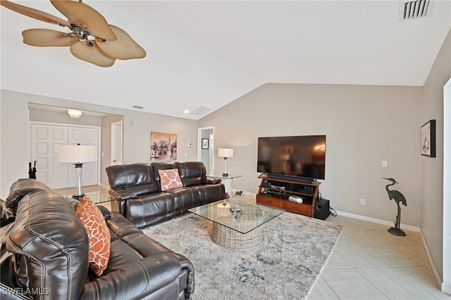 tiled living room with ceiling fan and vaulted ceiling