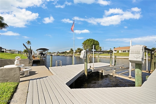 dock area with a water view