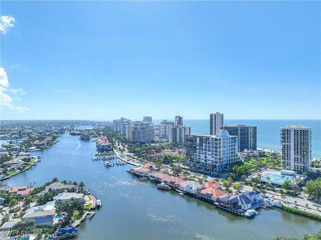 birds eye view of property featuring a water view