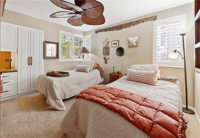 bedroom with carpet floors and ceiling fan