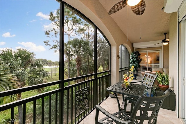 balcony featuring a ceiling fan