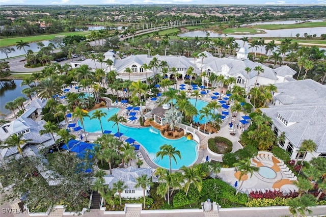 aerial view with a residential view and a water view