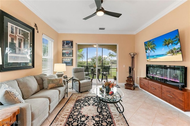 living area featuring crown molding, a healthy amount of sunlight, and visible vents