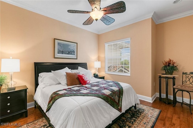 bedroom with baseboards, a ceiling fan, crown molding, and hardwood / wood-style flooring