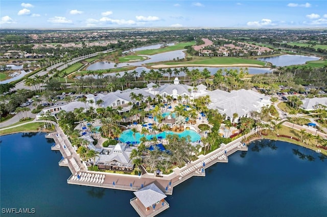 aerial view with a residential view, a water view, and view of golf course