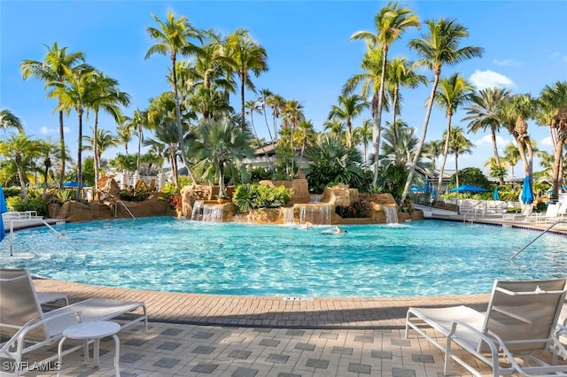 pool with a patio