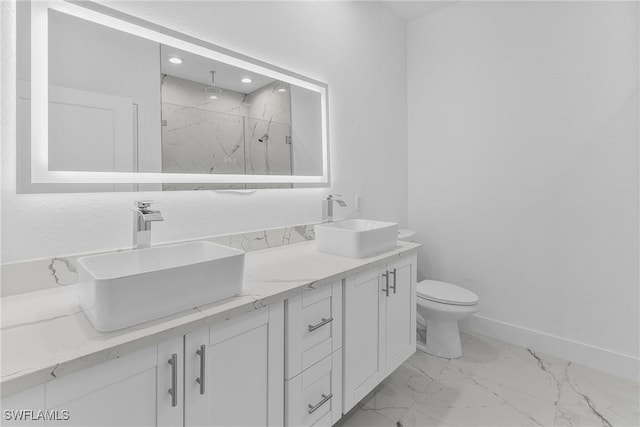 7014 Alfa Cir, Labelle, FL 33935 - bathroom with a marble finish shower, marble look tile flooring, toilet, double vanity, and baseboards