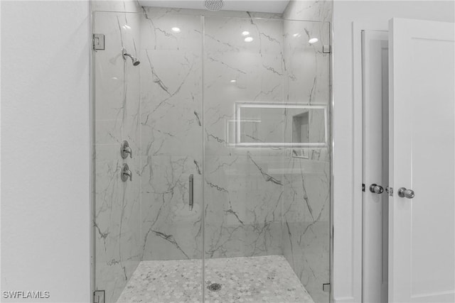 7014 Alfa Cir, Labelle, FL 33935 - bathroom featuring a marble finish shower