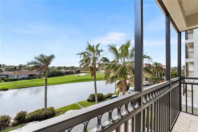 balcony featuring a water view