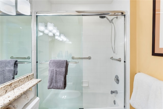 bathroom featuring enclosed tub / shower combo