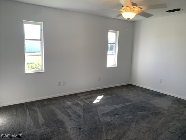 carpeted empty room with ceiling fan