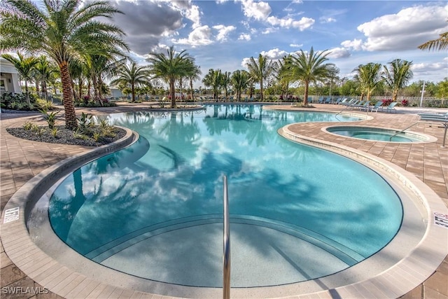 pool with a community hot tub