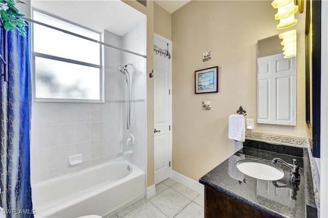 bathroom featuring tile patterned flooring, vanity, and shower / tub combo