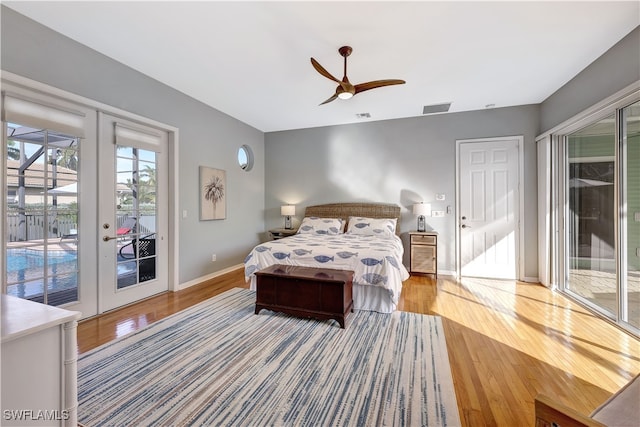 bedroom with hardwood / wood-style flooring, ceiling fan, access to exterior, and french doors