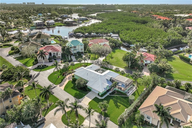 birds eye view of property featuring a water view