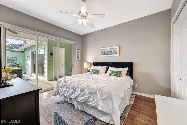 bedroom with access to exterior, ceiling fan, baseboards, and dark wood finished floors