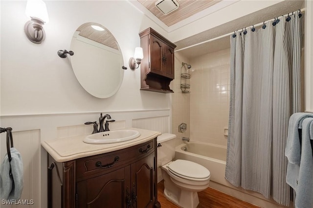 4914 Tudor Dr Unit 203, Cape Coral, FL 33904 - full bathroom featuring toilet, shower / bath combination with curtain, vanity, and wood finished floors