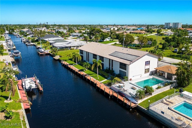 drone / aerial view with a water view