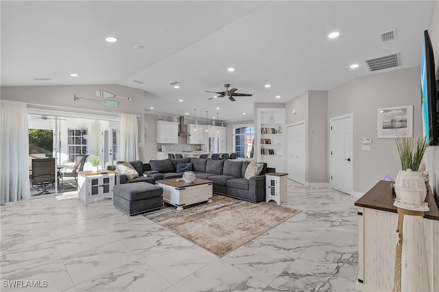 living room featuring ceiling fan, lofted ceiling, and french doors