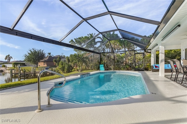 view of swimming pool with a lanai, a water view, and a patio