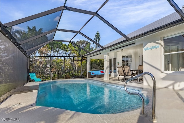 view of pool featuring a patio area and ceiling fan