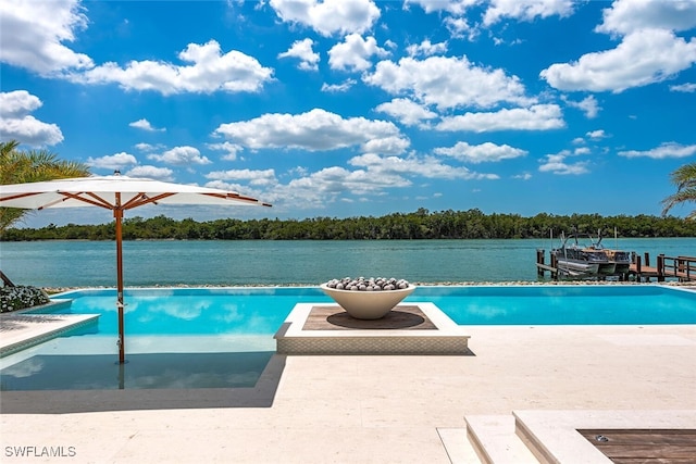 outdoor pool featuring a boat dock, a water view, and boat lift