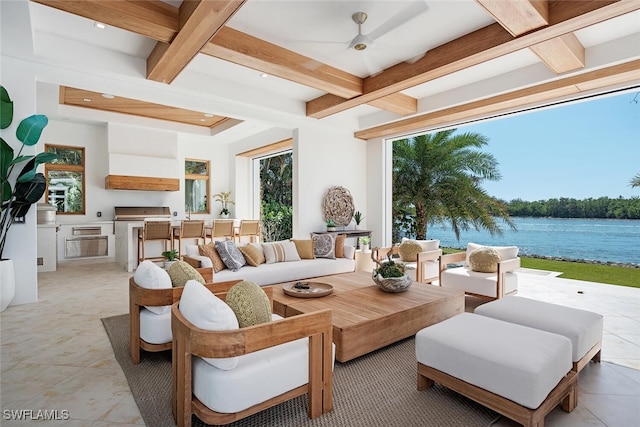 interior space with a water view, coffered ceiling, and beam ceiling