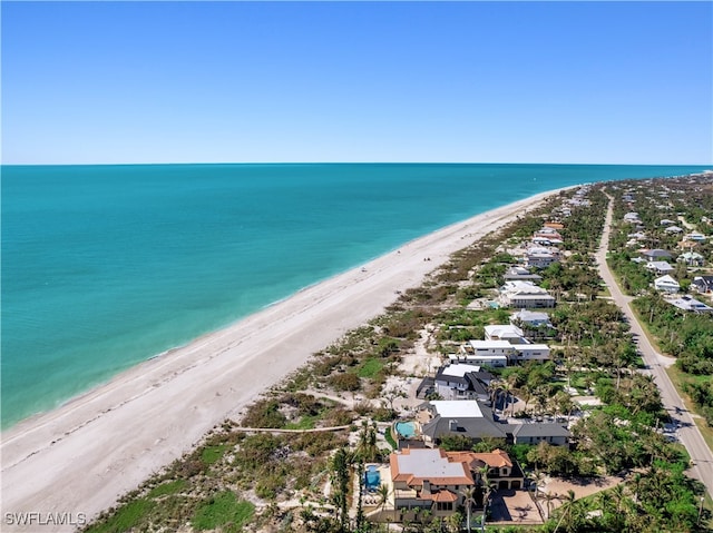 aerial view with a view of the beach and a water view