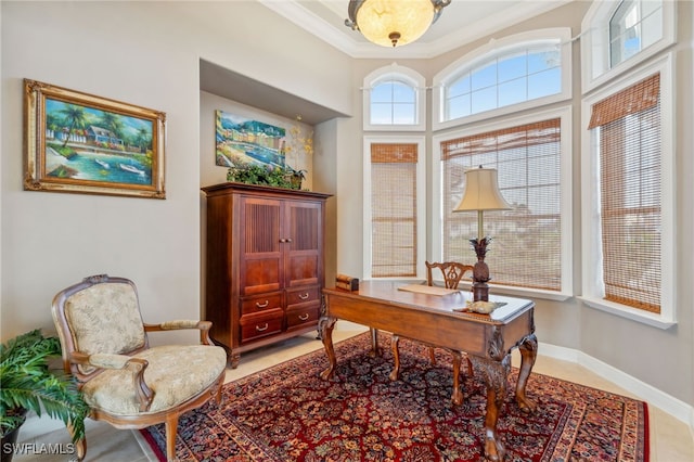 home office featuring ornamental molding and light tile patterned flooring