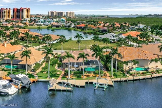 birds eye view of property featuring a water view