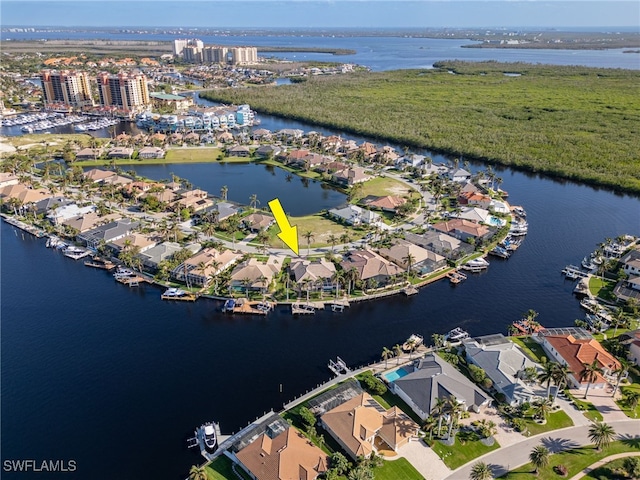 drone / aerial view with a water view