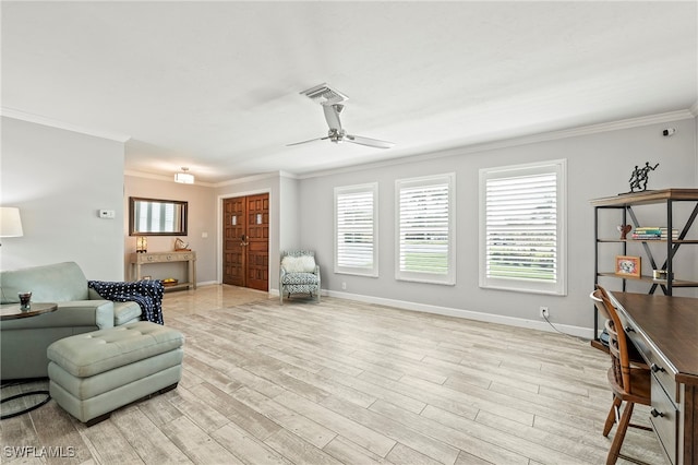 sitting room featuring ceiling fan, crown molding, and light hardwood / wood-style floors