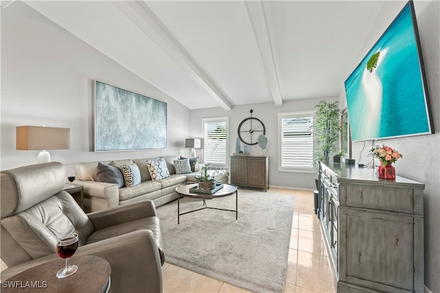 living room with vaulted ceiling with beams and light tile patterned flooring