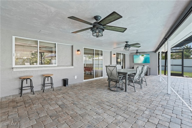 view of patio / terrace featuring ceiling fan