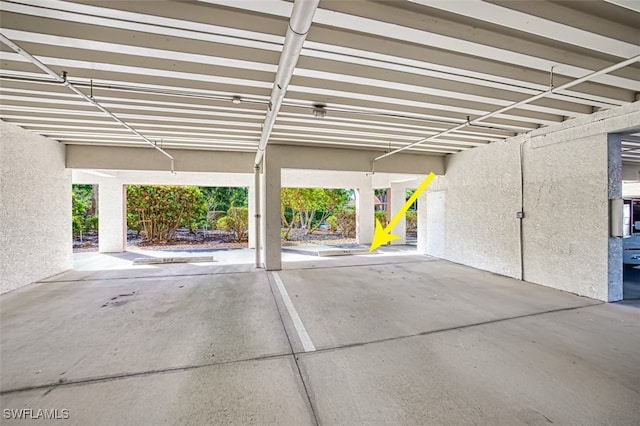 garage with a carport