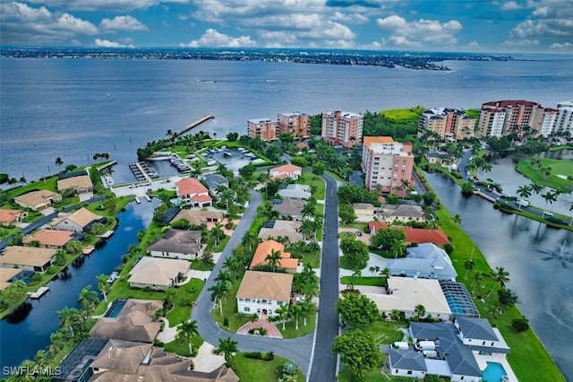 drone / aerial view with a water view