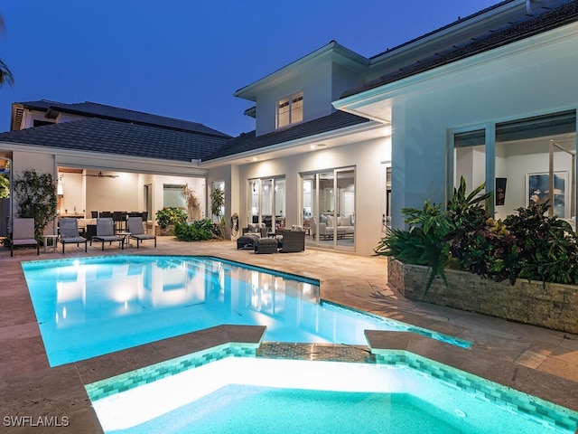 view of pool featuring a patio area and an outdoor living space